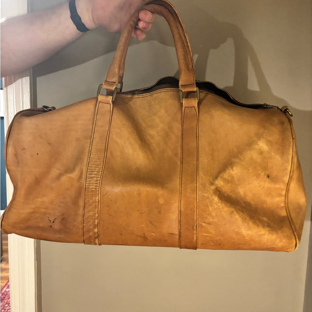 TUMI leather duffel bag